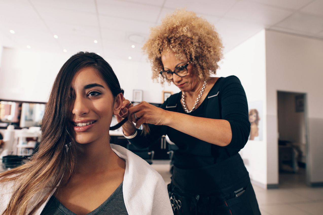 Female Hair Stylist Working