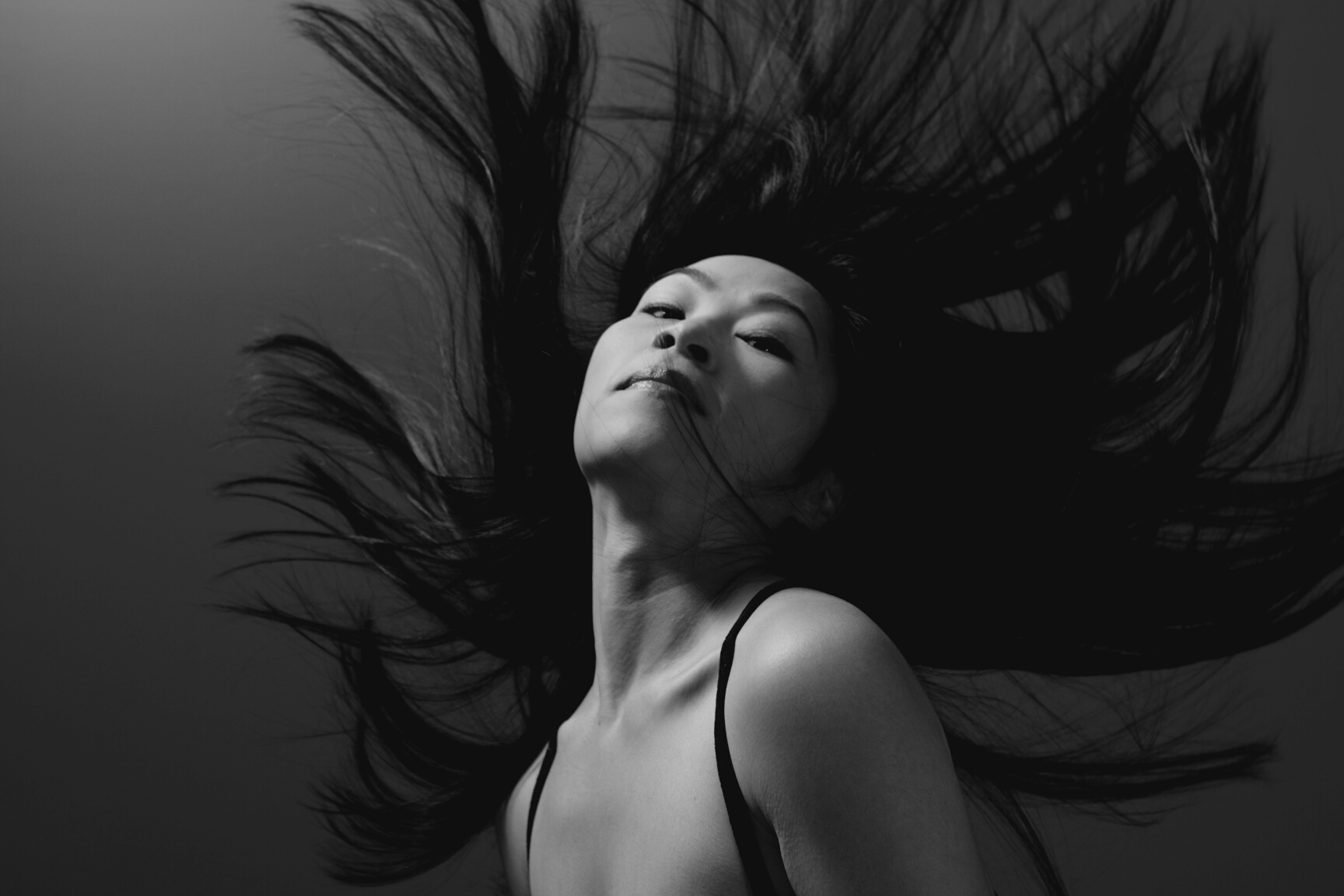 Asian model flipping her hair