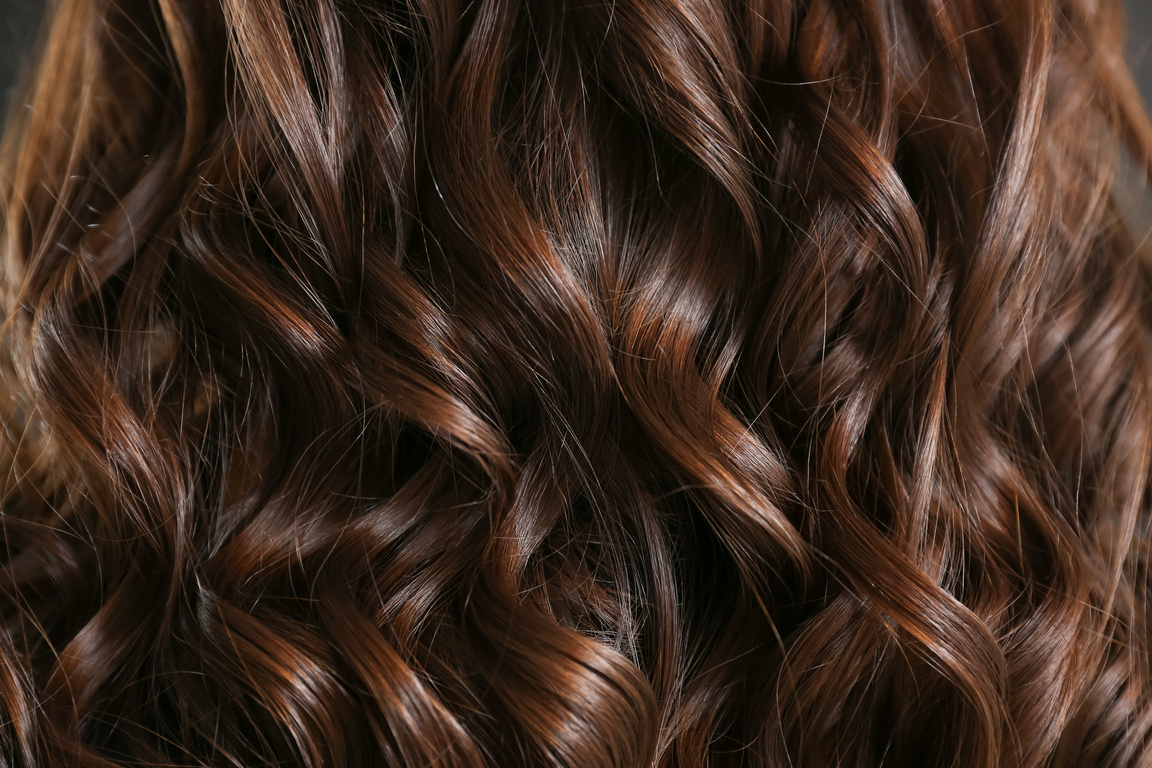Healthy Brown Hair with Shiny Waves and Curls